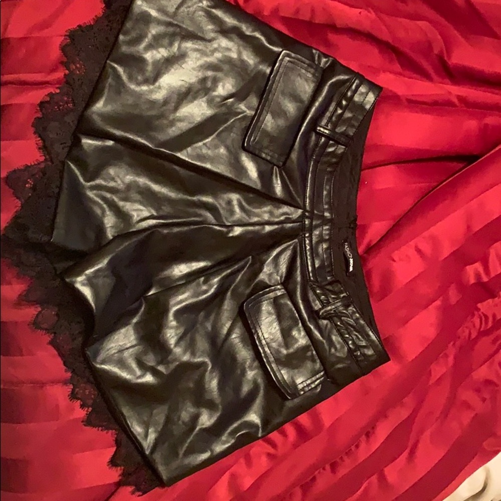 Leather shorts with lace trim